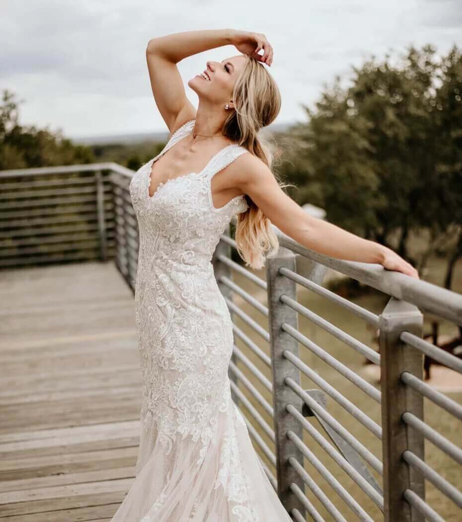 Model wearing a glitz & glam style white gown