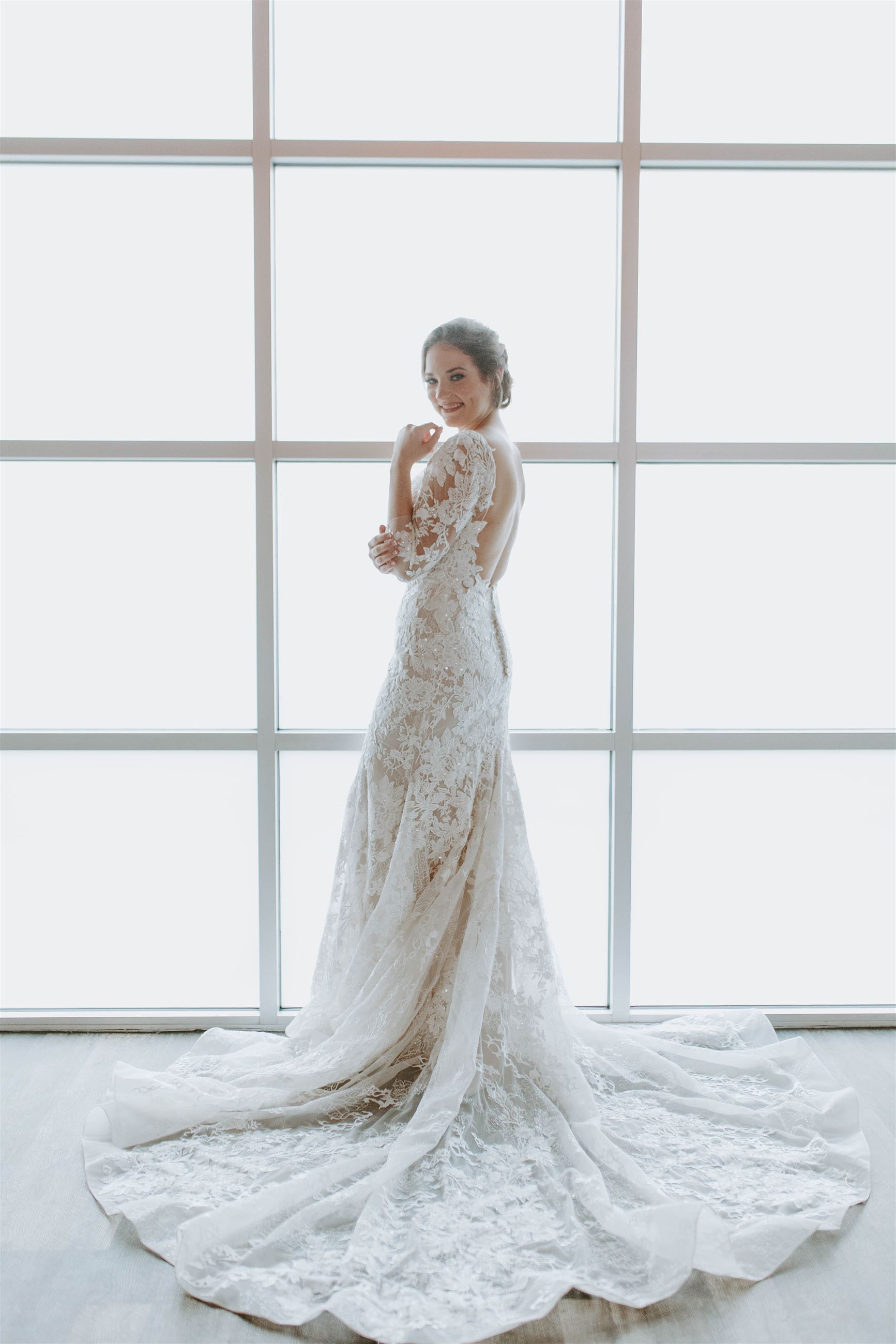 Model wearing a white gown 7