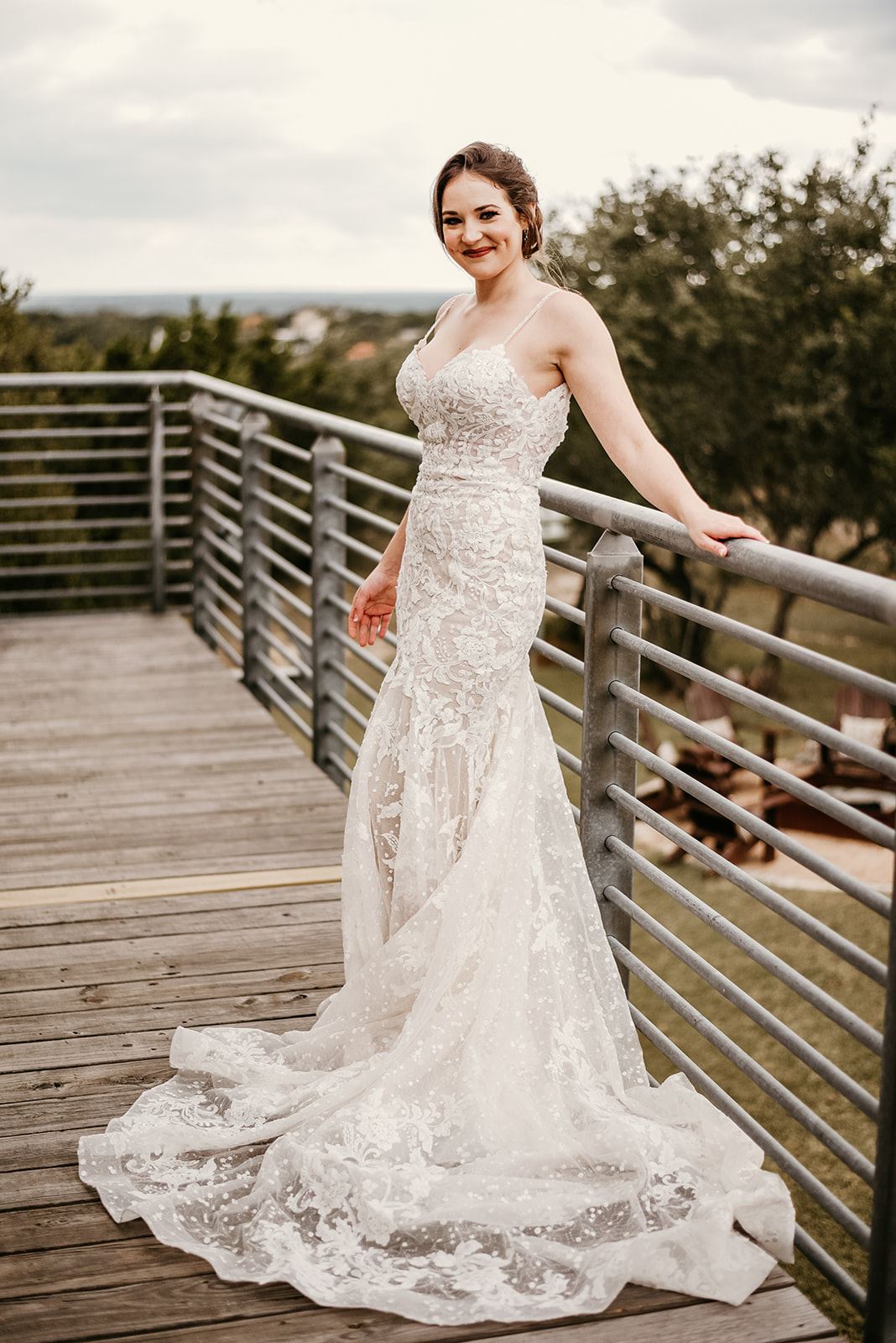 Model wearing a white gown 23